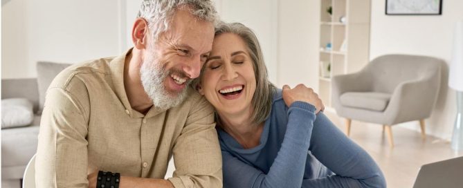 couple laughing in living room